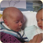 09-Anselm and Alma in same crib